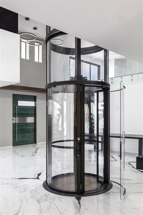 Black Vuelift Round With Cab Gate Open Glass Elevator House Elevator Elevator Ideas