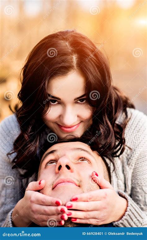 Young Happy Couple Outdoor In The Park Stock Image Image Of Outdoor Logs 66928401