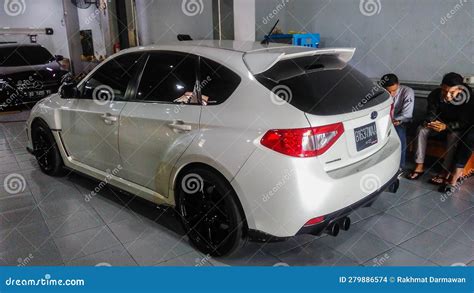 White Subaru Wrx Sti Hatchback In A Workshop Editorial Stock Image