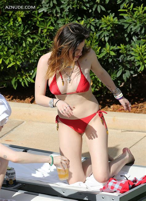 bella thorne wears a red bikini with sister dani by the pool in miami aznude