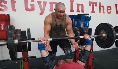 Powerlifter Mark Bell Teaches Us How To Safely Spot The Squat Bench