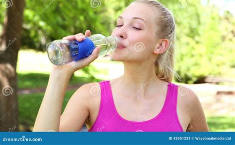 Fit Blonde Drinking Water In The Park Stock Video Video Of 1080p