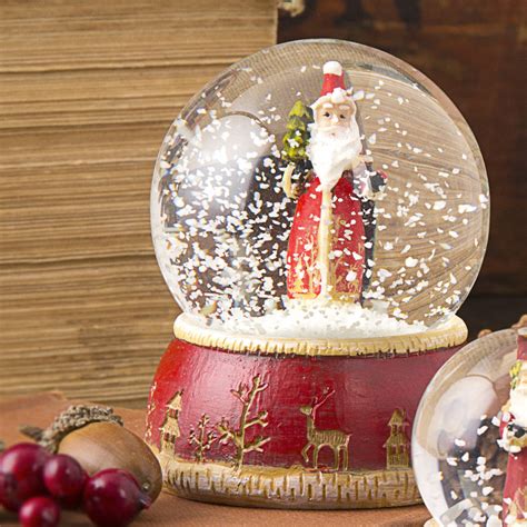 Traditional Santa Snow Globe By The Christmas Home