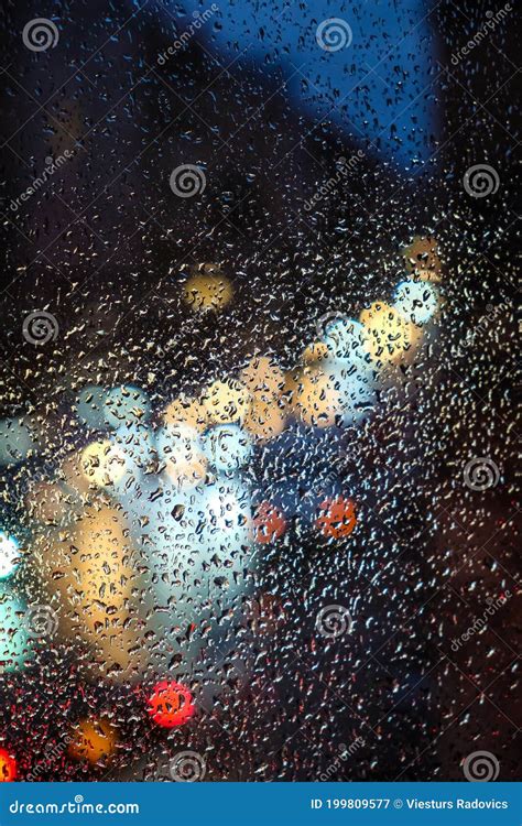 Rainy Day Rain Drops On Window Rain And Traffic Lights Bokeh Traffic