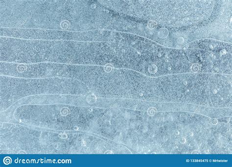 Frozen Cracked Ice Surface Background With Air Bubbles Stock Image