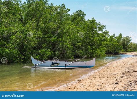 Wooden Dugout Rowing Pirogue Boat On The Shore Editorial Image