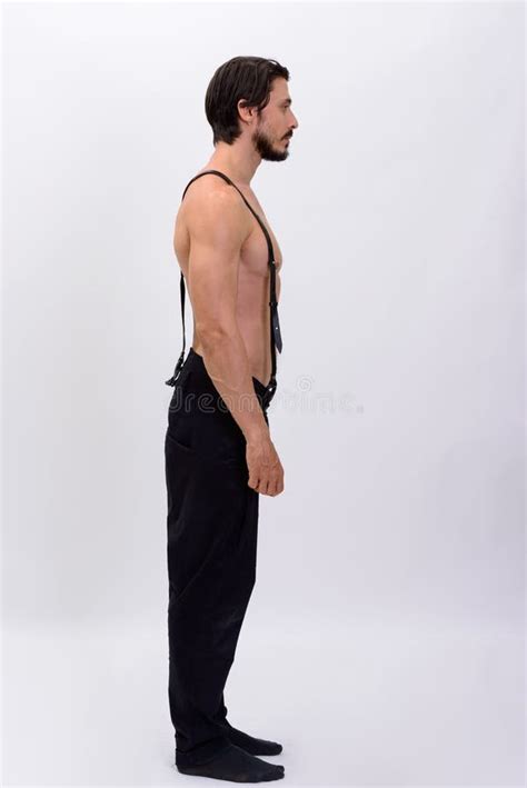 Full Body Shot Profile View Of Handsome Muscular Man With Suspe Stock
