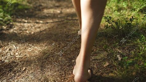 Young Woman Walking In Forest Barefoot Stock Video Footage 10419643