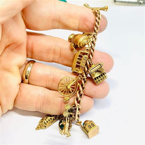 Superb Heavy Vintage 9ct Gold Charm Bracelet With 14 Gold Charms