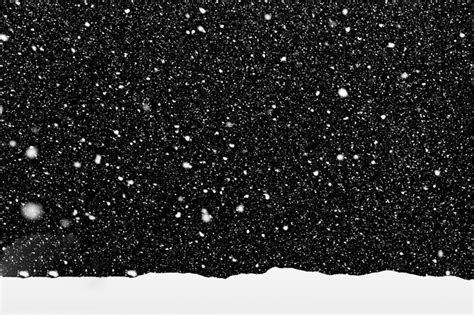Premium Photo Real Snowfall On Black Background With Snow On The