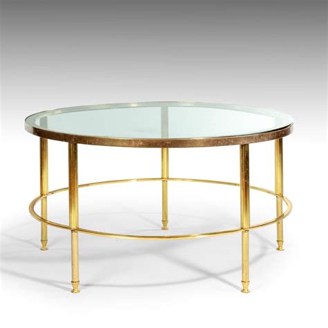 A Mid Century Lacquered Brass And Glass Coffee Table William Cook