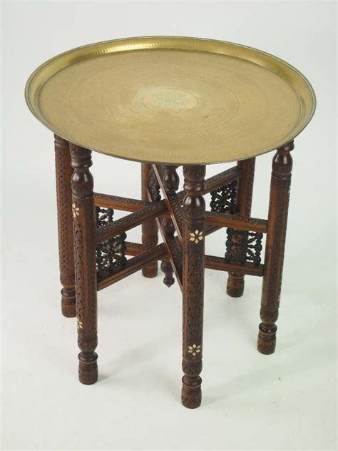 The tray base can be used either side up. Antique Benares Brass Tray Table / Coffee Table