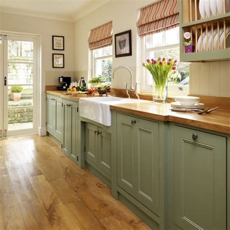 Sage green kitchen cabinets design photos ideas and inspiration. green galley kitchen | Beautiful kitchen cabinets, Green ...