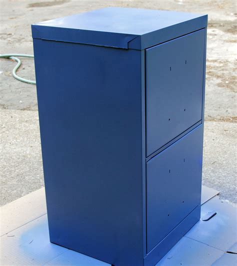 Cabinet spraying & drying racks used by the paint life crew painting cabinets. Paint a File Cabinet Blue: $5 Revamp » Dollar Store Crafts
