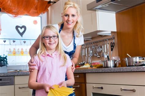 Mother And Daughter Cooking Together Stock Image Image Of Housewife Homemaker 35459967