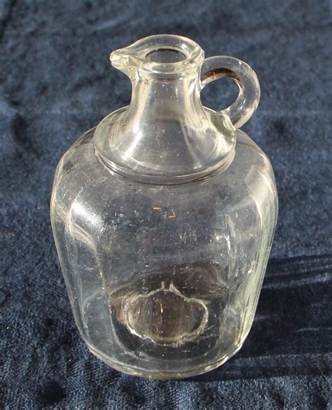 Antique Beveled Glass Pint Jug With A Ring Handle And Pour Spout By