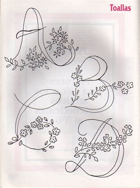 Some Type Of Embroidery Design With Flowers And Leaves On It S Side