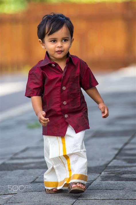 Micro Fashion A Child Dressed Up In Traditional Kerala Outfit As Part