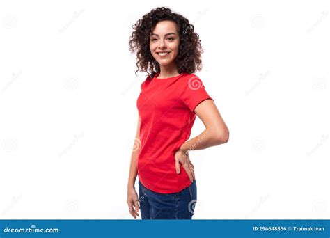 Young Beautiful Curly Brunette Woman Dressed In A Red T Shirt With An Identity Print Mockup