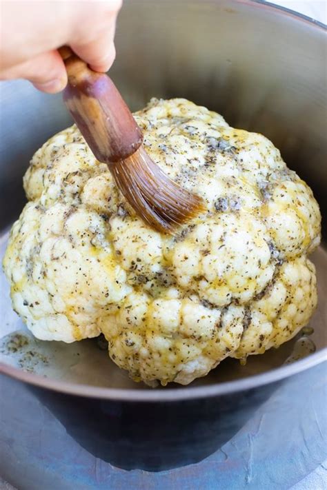 Garlic And Herb Whole Roasted Cauliflower Low Carb Delicious Vegan