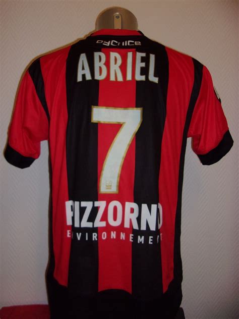 / olympique gymnaste club nice côte d'azur are a football club currently in ligue 1, the top tier of french football. OGC Nice Home football shirt 2012 - 2013.