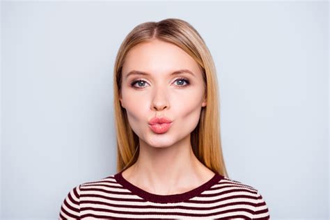 Close Up Portrait Of Amazing Woman Pulled Her Lips To Kiss Someone