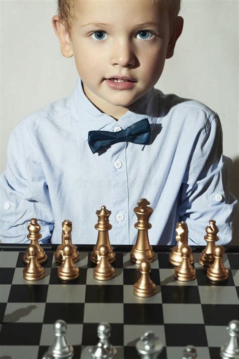 Smiling Little Boy With Chesssmart Kidgenius Childchessboard Stock