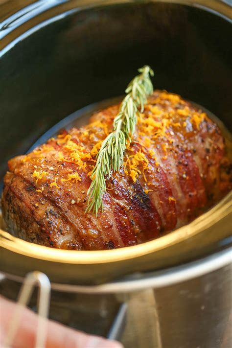 The bacon adds flavor and fat to the lean meat, making it juicy and flavorful. Slow Cooker Bacon Wrapped Pork Loin - Damn Delicious