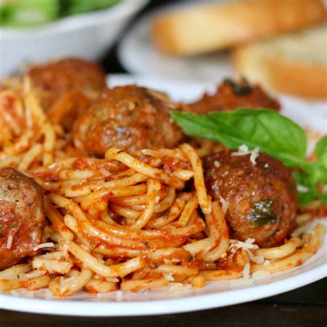 This easy meatball recipe is so easy to make and come out juicy and flavorful every time. EASY CROCK POT SPAGHETTI AND MEATBALLS | The Country Cook