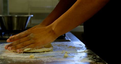 Chef Kneading Dough In Kitchen At Restaurant Stock Footage Sbv