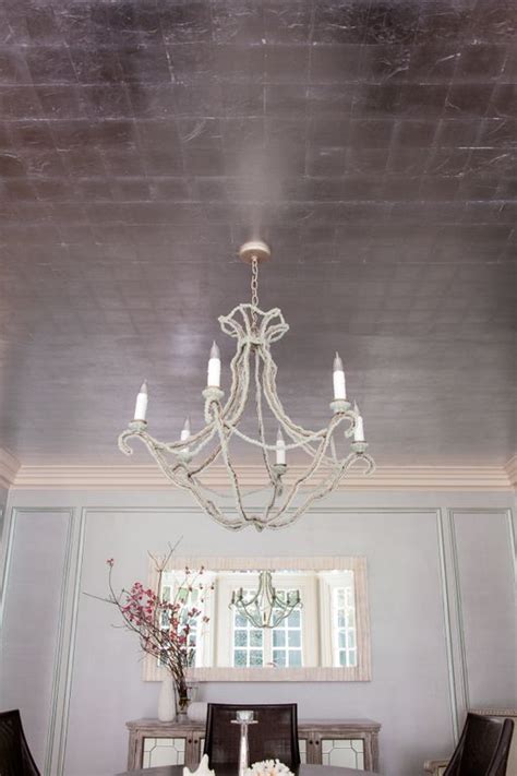 First thing you have to do is roll size on the entire surface whether it's a wall, ceiling, or piece of furniture. Silver leaf ceiling against metallic textured walls ...