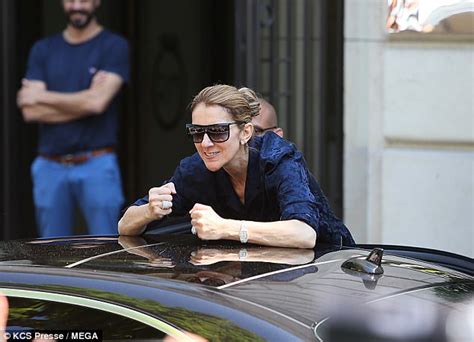 Celine Dion Climbs Out Of Her Car Dressed In Silk Pyjamas Daily Mail