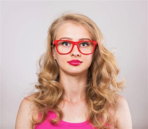 Premium Photo Studio Portrait Of A Pretty Girl In Red Glasses