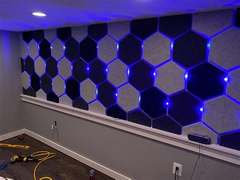 A Room That Has Some Lights On The Wall And Is Being Worked On By An