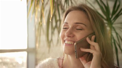 Woman Speaking On Phone Close Up Of Face Stock Footage Sbv 323887443