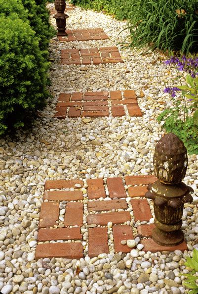 This is a simple landscaping idea but a visually appealing use of brick pavers and stone in the garden. How to Decorate Your Garden with Red Bricks