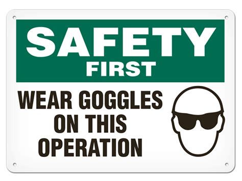 incom safety first wear goggles on this operation safety sign