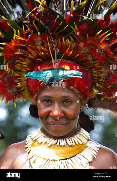 Woman Dressed In Traditional Tribal Costume And Headdress At The