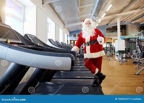 Santa Claus In The Gym Doing Exercises Stock Image Image Of Christmas Equipment 102201377