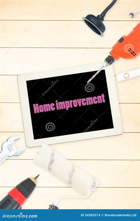 Home Improvement Against Tools And Tablet On Wooden Background Stock