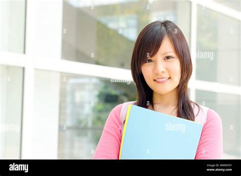 College Student Standing Outside College Building Stock Photo Alamy