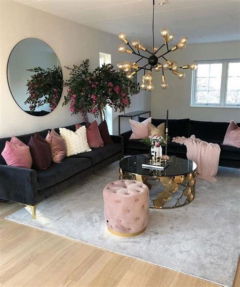Light Black Sofa With Dusty Pink Cushion Shades Completing The Look