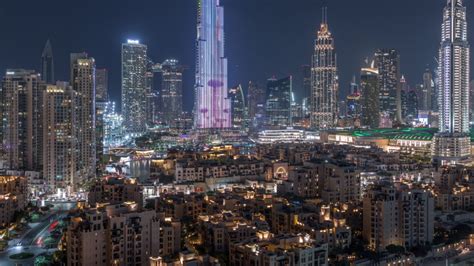 Dubai Cityscape At Night With Burj Khalifa In Center In The United Arab