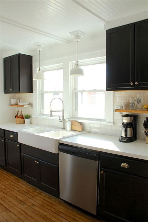 If you are looking for a natural stone which adds warmth to your kitchen with white cabinets, black soapstone countertop is the best choice. 21 Black Kitchen Cabinets Ideas You Can't Miss | Black ...
