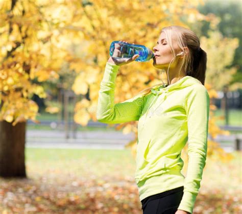 Woman Drinking Water After Doing Sports Outdoors Stock Image Image Of