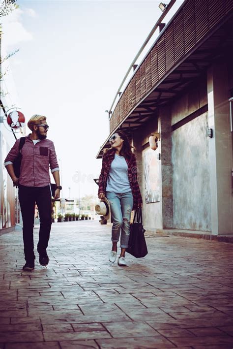 Portrait Of Hipster Couple Walking In The Street Urban Couple E Stock