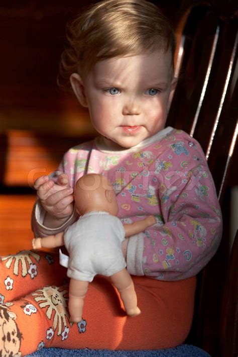Girl With Doll Stock Image Colourbox