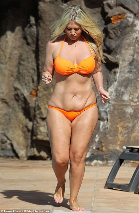 Frankie Essex Displays Fuller Figure As She Slips Into Skimpy Orange Bikini Daily Mail Online