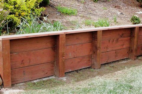 Determine how many rocks you need to build your wall by measuring the planned dimensions of your wall to the nearest foot. Retaining Walls Construction Portfolio | A and J Fencing