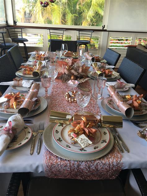 Table Setting Decorated For Christmas In Rose Gold Rose Gold